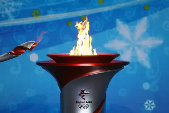 Щафетата с олимпийския огън за Зимните олимпийски игри през 2022