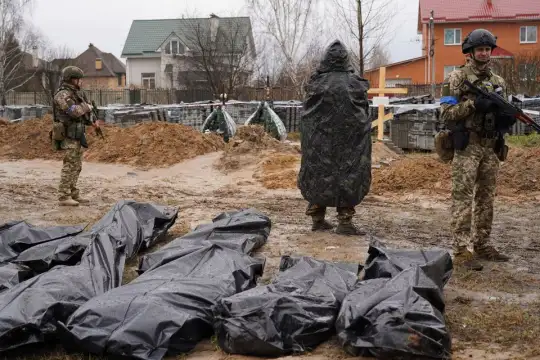 Криминалистите започнаха ексхумация на масов гроб в украинския град Буча