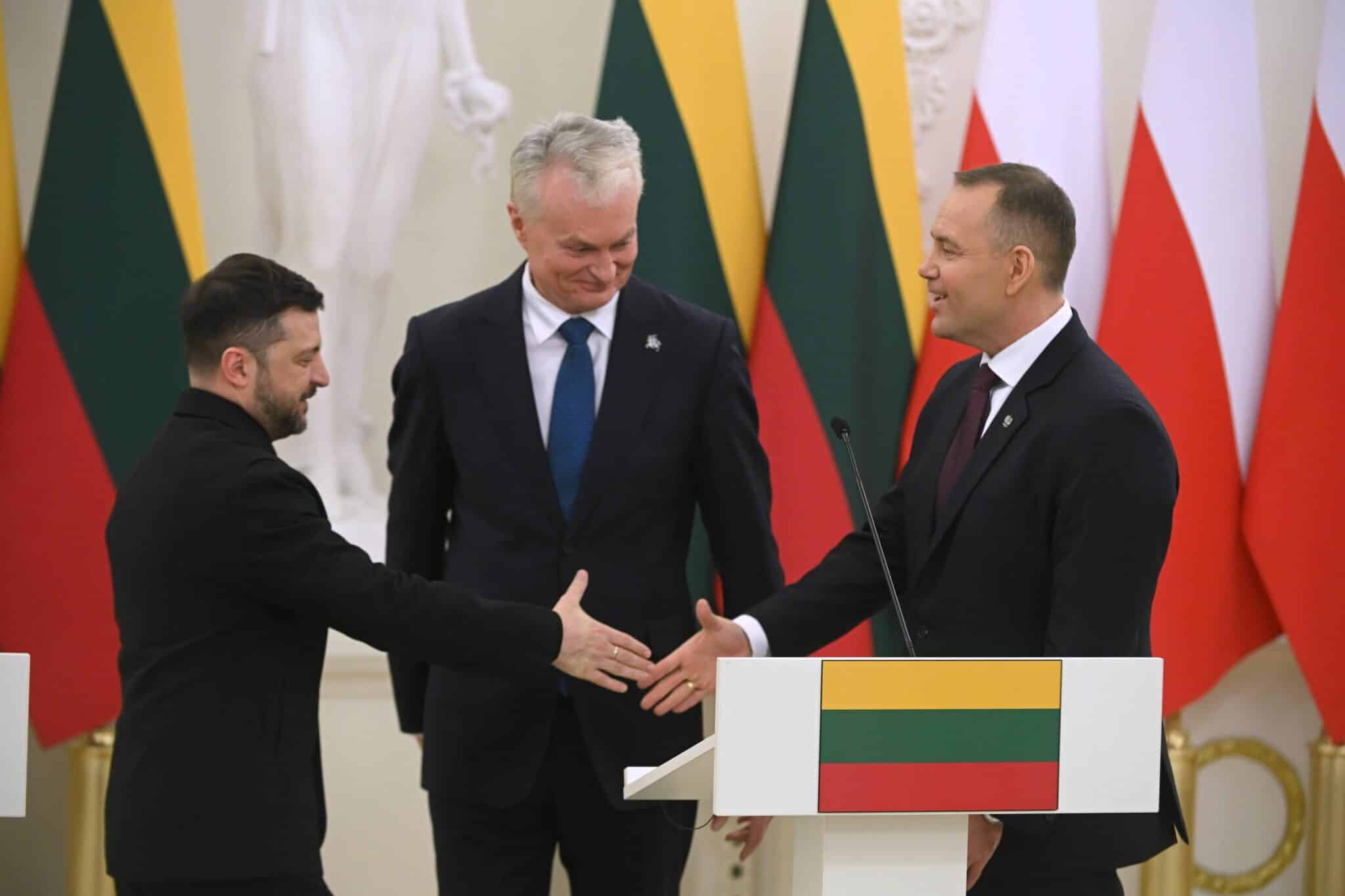 Ukraine's President Volodymyr Zelensky, Lithuania's President Gitanas Nauseda and Poland's President Karol Nawrocki attend a joint press conference at the Presidential Palace in Vilnius